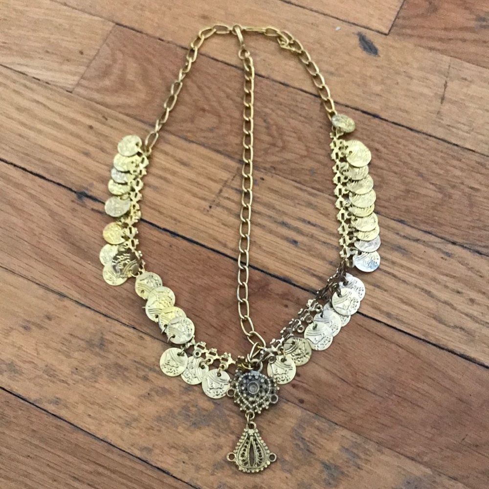 Cleopatra head adornment